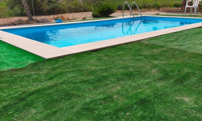 Deltebre Apartment | Studio Apartment 'Estudio La Cochera' with Shared Pool, Wi-Fi and Air Conditioning.