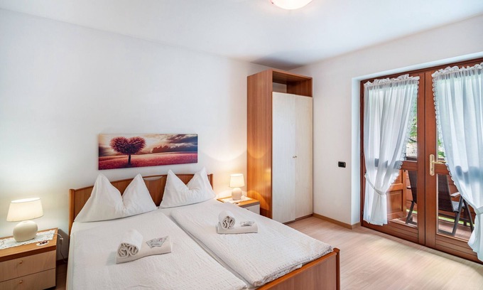 Rocca Pietore Apartment | Studio Apartment 'Appartamento Monolocale 4' with Mountain View, Shared Garden and Wi-Fi