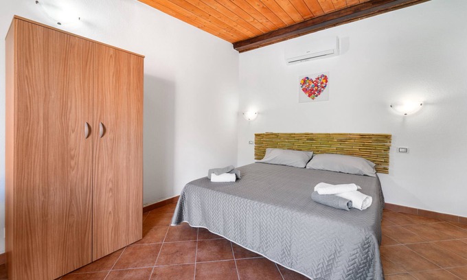 Teulada Apartment | Studio 'Il Cedro' with Mountain View, Private Terrace and Air Conditioning