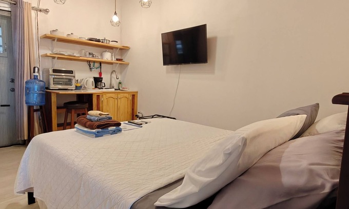 St. John's Apartment | Studio- Spacious garden area/on-site car rental