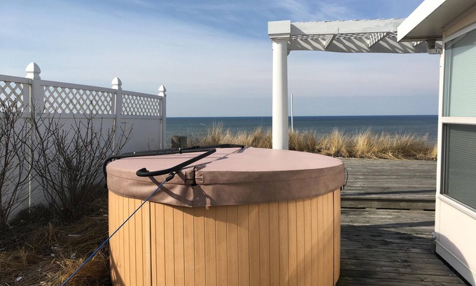 West Olive Cottage | Stunning Lake Michigan views in our light, airy beachfront cottage. Sleeps 10.