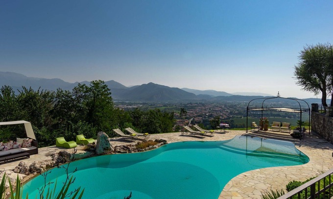 Colombaro Villa | Stunning private villa for 14 people with WIFI, private pool, hot tub, TV, patio and parking
