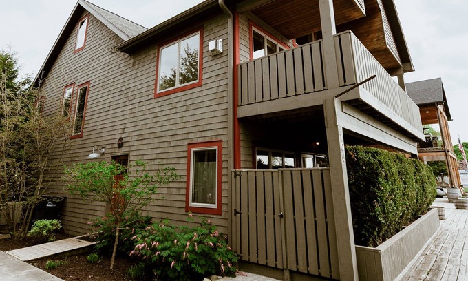 Leland House | Stunning views of Leland Harbor & Fishtown, and sunsets between the Manitou's!