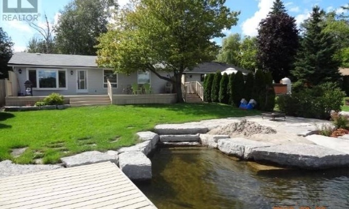 Kawartha Lakes Cottage | Stunning Waterfront! Easy access stairs to water, wifi. Central AC , 2 bathrooms