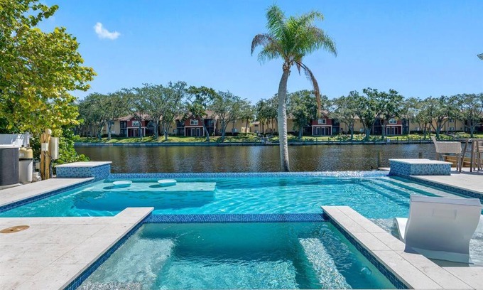 Tampa Shores House | Stunning Waterfront Canal Home Heated Pool/Hot tub Amazing Views