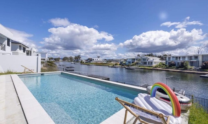 Helensvale House | Stunning waterfront family home with pontoon newly