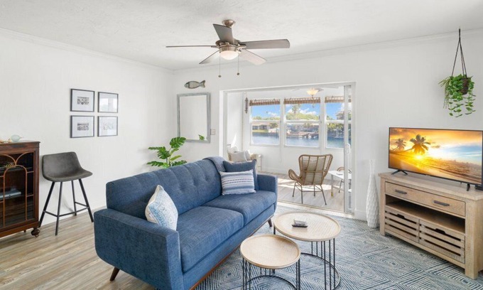 Capri Isle Condo | Stylish canal-front condo w. peaceful views, close to beach