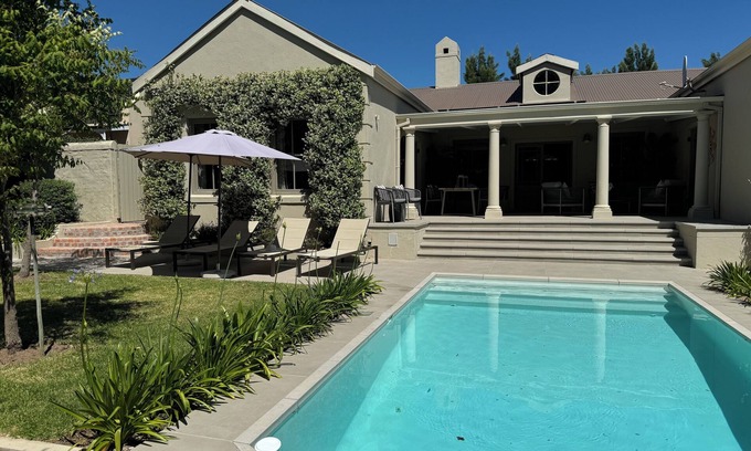 Franschhoek House | Stylish House + Pool situated amongst vine's & olive trees, exclusive domaine