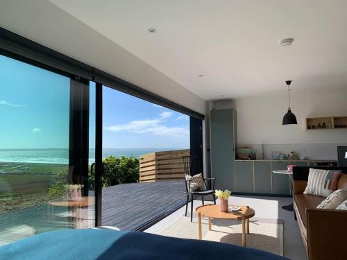 Penycwm House | Subterranean Studio with Panoramic Costal Views and Sauna