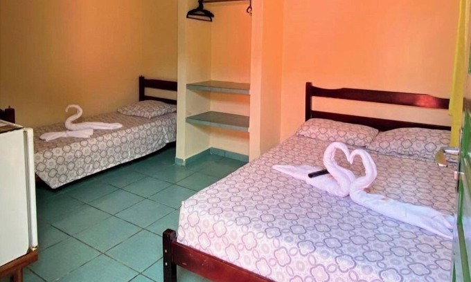 Pereque-Acu Hotel | Suites Casa Rosada