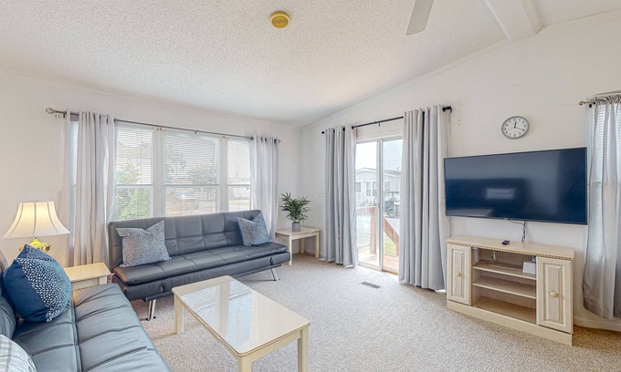 Assateague Pointe House | Sunny coastal home with private patio, on-site pool, central AC, & W/D