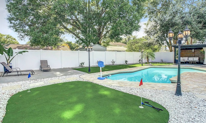 Greater Northdale House | “Sunny Retreat” Pool & mini Golf