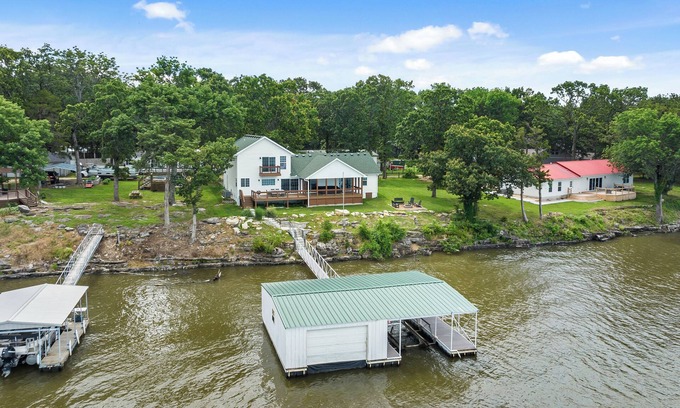 Grove House | Sunset Cottage on Grand: Waterfront Views - Dock - Fire Pit - Boat Parking