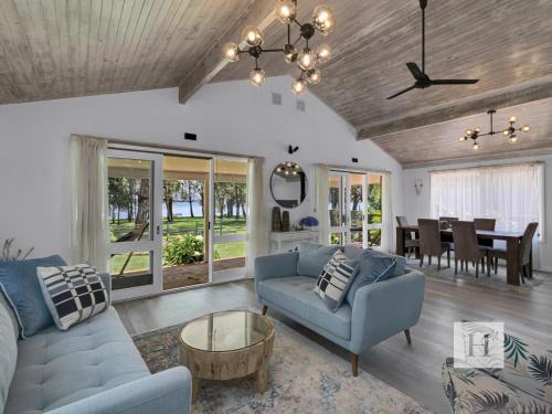 Chain Valley Bay House | Sunset Escape