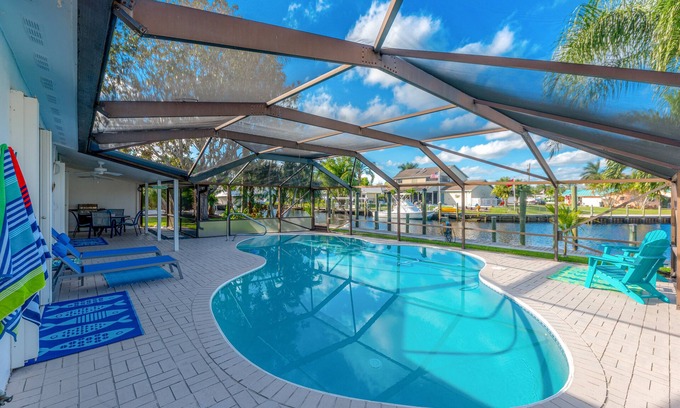 Palm City House | Sunset Landing amazing waterfront Views.