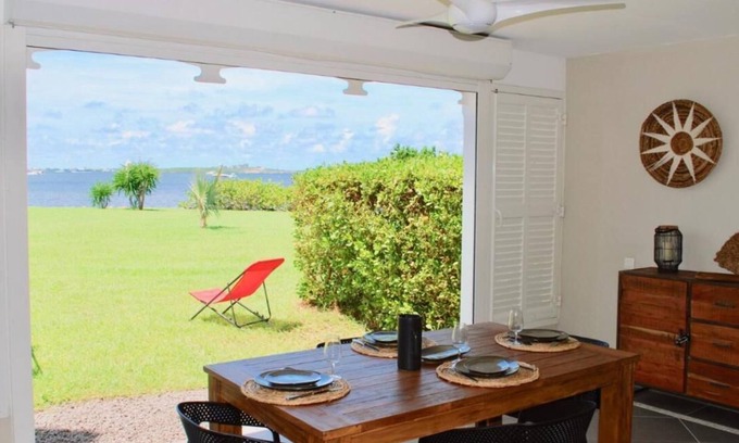 Marigot Apartment | Sunset on lagoon from the terrace