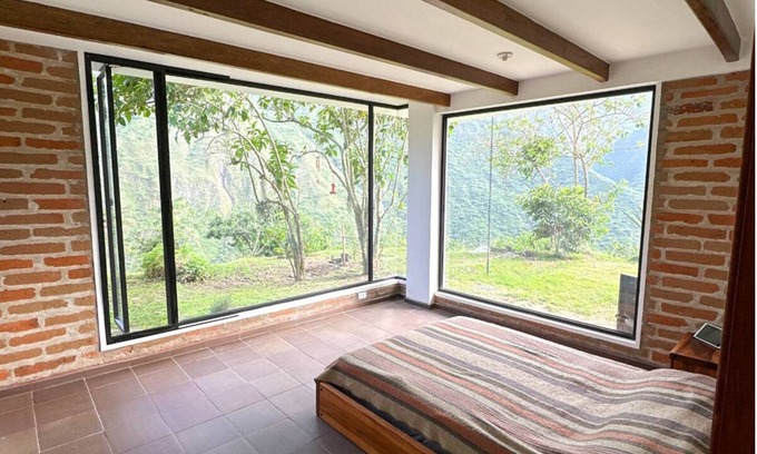 Calacali Bed & Breakfast | Sunset Room at The Cloud Forest Retreat