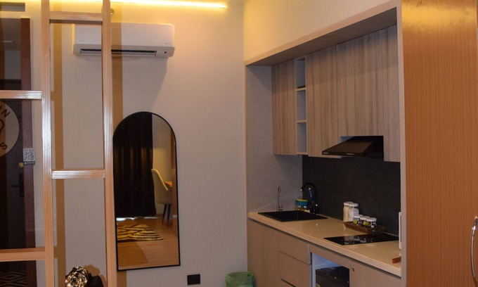 Greater Noida Apartment | Sunset View With a King Size Bed at Mall