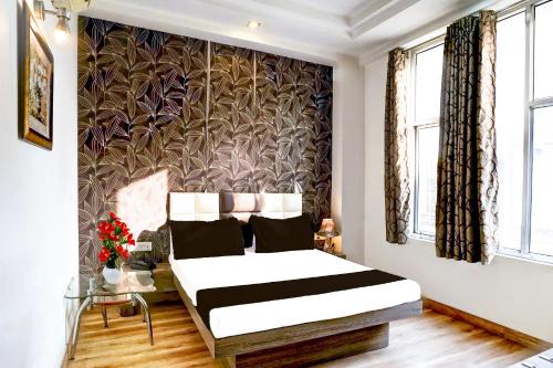 Sindhi Camp Hotel | Super Collection O Banipark Formerly Arena Villas