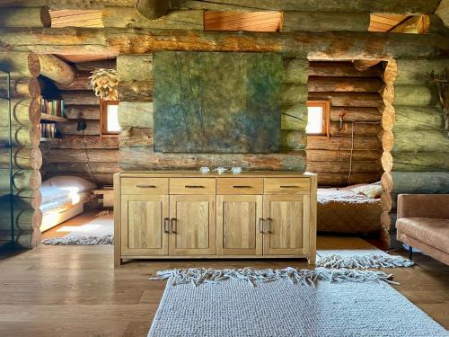 Rovaniemi Ski Chalet | Suvantokoto Riverside Log Cabin