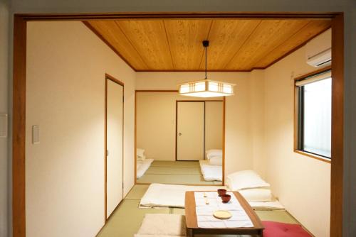 Shin-Osaka House | SYOGA A house, next to natural park