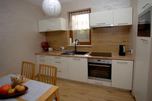 Jaworki Apartment | Szarlotka
