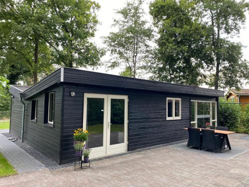 Hattemerbroek Ski Chalet | 'T Veluwse Boshuus chalet 44