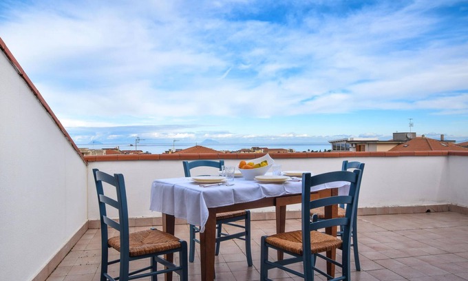 Sant'Agata di Militello Apartment | Tasteful top floor apartment with great roof terrace with beautiful sea view.