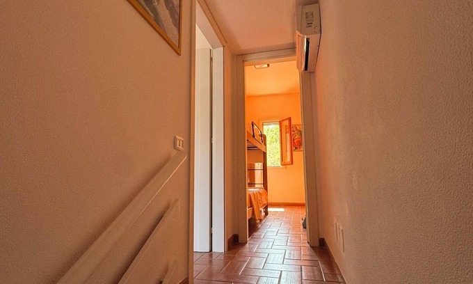 Acaya Apartment | The apartment is developed on two levels within a tourist village