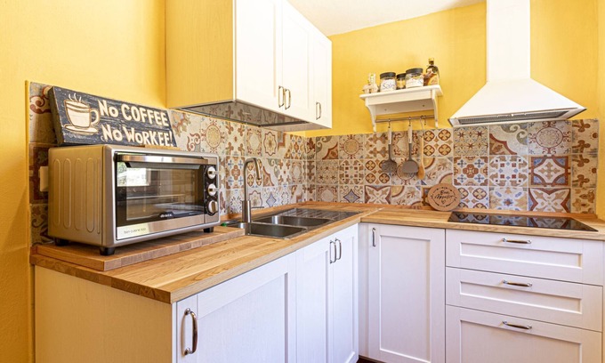 Seccheto Apartment | The apartment Tania is in Seccheto, with a beautiful view on the bay. It is completely renovated and