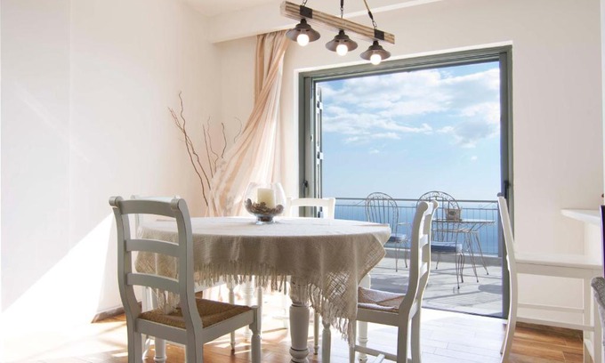 Tseria House | The balcony of Mani
