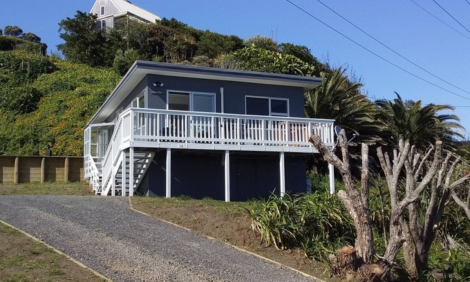 Raglan House | The beach front bach with ocean views!