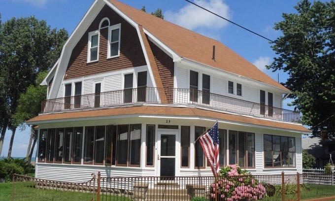 Huron House | The Buster Brown Shoe House - lakefront with gazebo and wrap-around porch