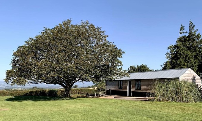 Paignton Ski Chalet | The Cabin at Barnstormers, luxury woodland setting