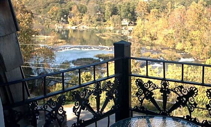 Hardy Villa | The charming French Chateau overlooks the beautiful falls of the Spring River