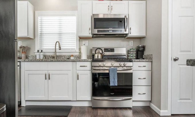Concord House | The Concord Cozy · Remodeled Home w/King Bed, Bunk Bed, & Yard Games