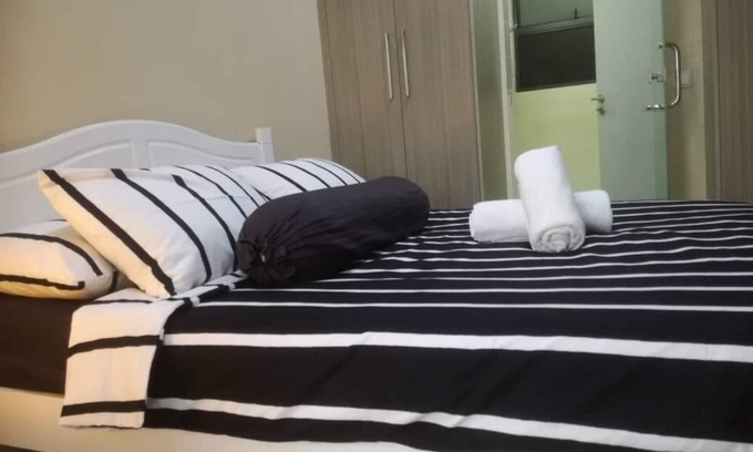 Central District Apartment | The Cribs Homestay where u can enjoy our stunning view by the pool.