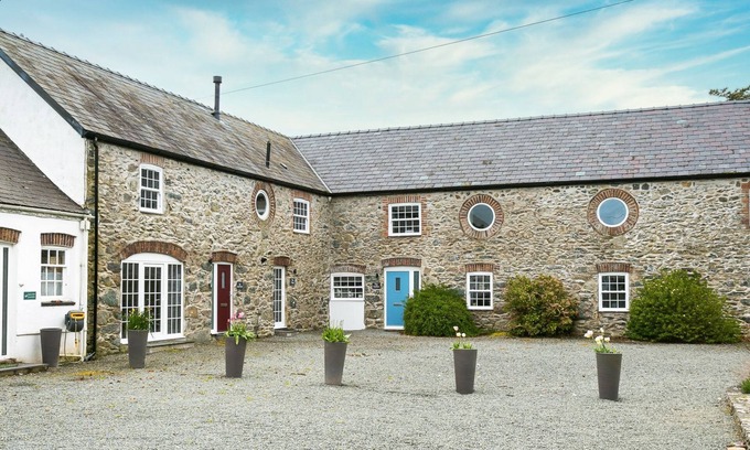 Bryngwran Cottage | The Forge - cottage with hot tub hat sleeps 4 guests in 2 bedrooms