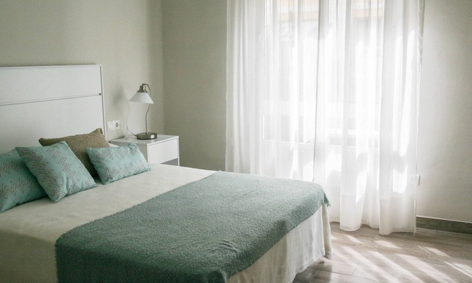 Distrito Centro Apartment | The House of the Wall
