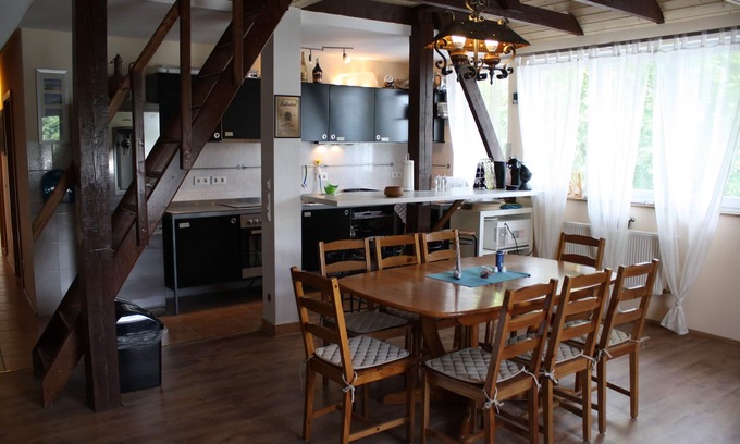Schwerin Apartment | The house on the lake, with small. Beach, bathing area, gr. Sunbathing lawn, playground