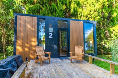 Waitoki House | The Kauri Sanctuary by Tiny Away