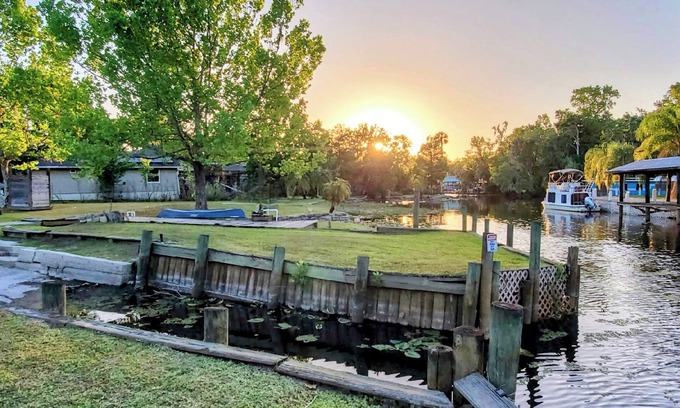 Astor House | The Launch Pad - Dog-friendly House with Boat Ramp on deep canal corner lot