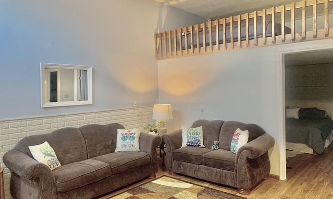 Sunrise Beach House | The Lazy Loft: Private dock, boat slip, ramp. And storage