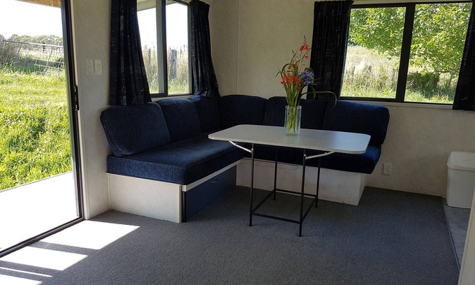 Parawera House | The Organic Farm Hut is located in a working farm. experience the country life!