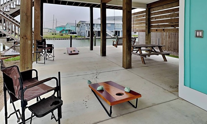 Rockport House | The Reel Getaway | Waterfront Home, Private Fishing Dock, Covered Patio + Swing!