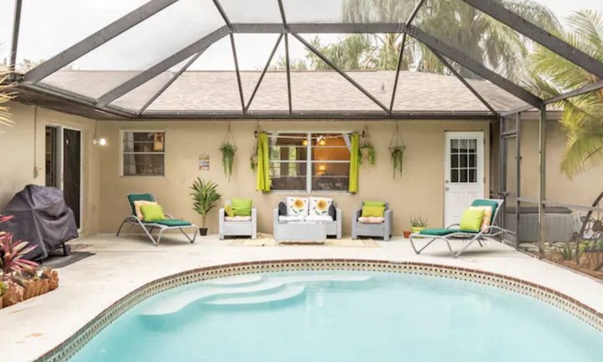 Port Malabar House | The Rustic Retreat: Heated Pool, Movie Theater, Event Rental !