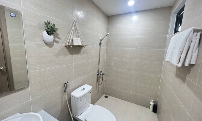 Hue City Centre Apartment | the tourist apartment has 2 bedrooms and a kitchen.