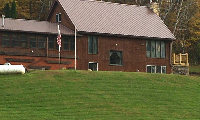 Richland Center House | This 3 story home is set on a hillside & includes all imaginable amenities.