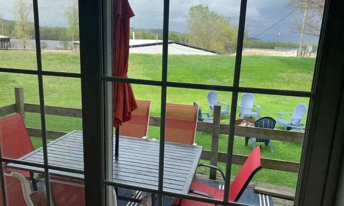 Marshland Apartment | This AMAZING river getaway is PERFECT for YOU! Private deck, grill & fire pit!