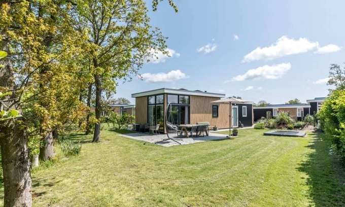 Burgh-Haamstede House | This attractive chalet is located in a beautiful location at the back of Schouwenduin, surrounded by